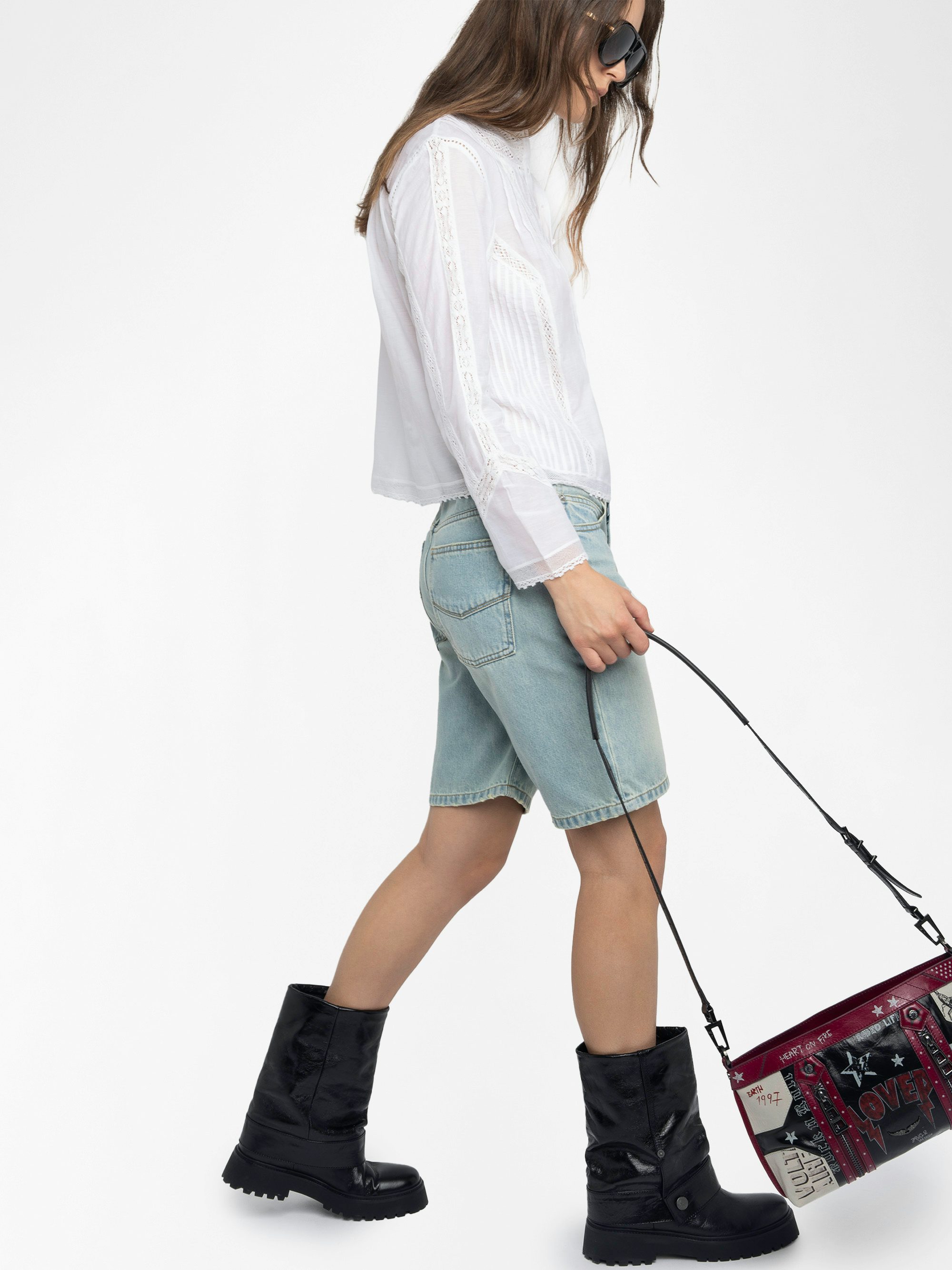 Sunny Moody Punk Bag - Vintage-inspired patent leather bag with adjustable shoulder strap and wing signature.